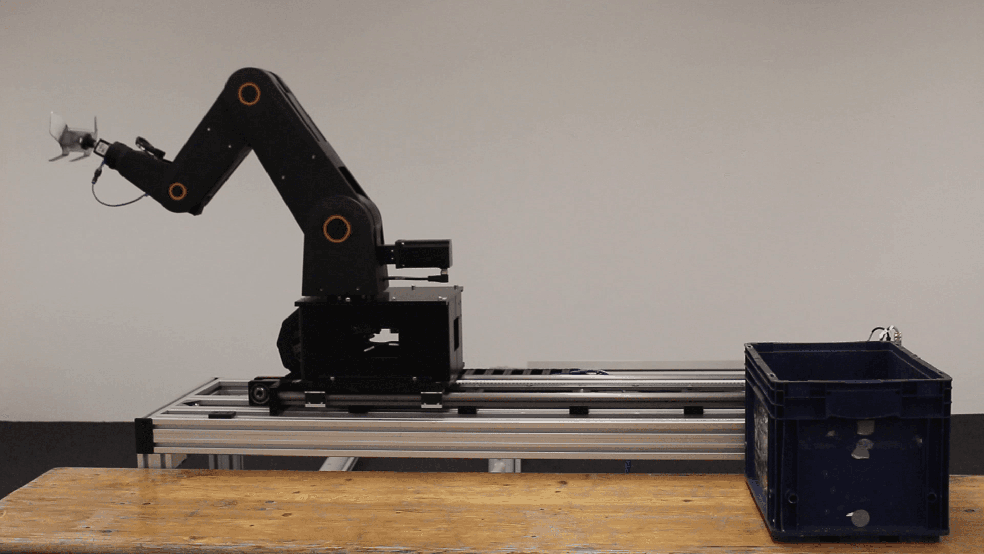 igus five axis robot is picking metal parts