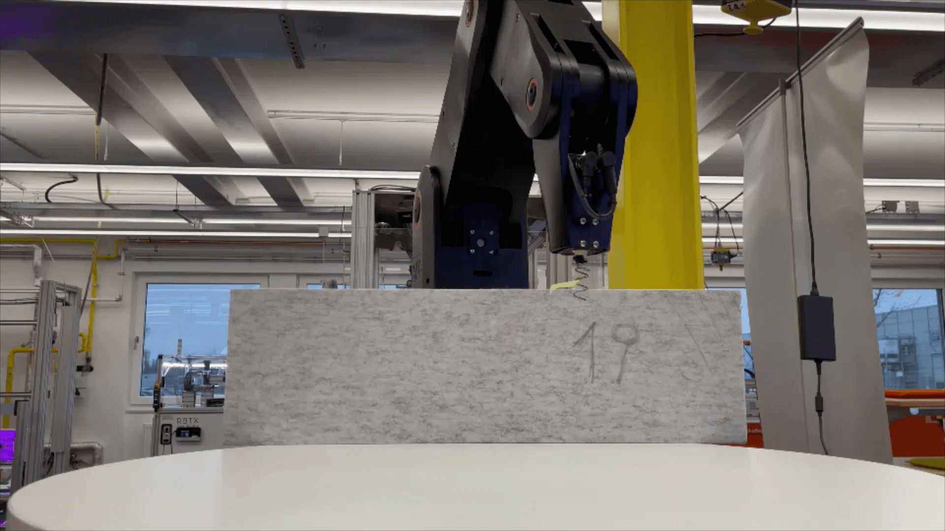 Robot arm turns springs into foam mattresses