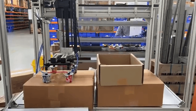 Automated packaging of yoghurt pots